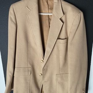 Tan suit.